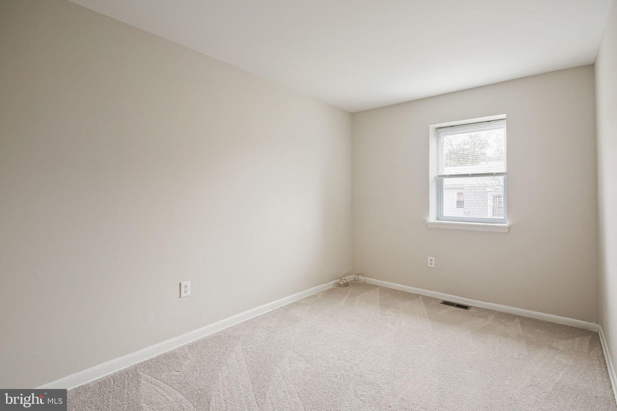 8209 Stewarton Court Severn, MD 21144 - Photo 20 of 34 an empty room with a window