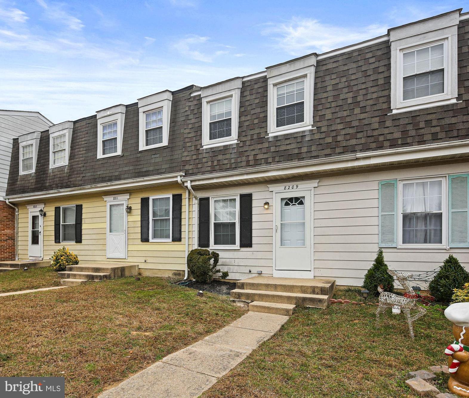 8209 Stewarton Court Severn, MD 21144 - Photo 2 of 34 a front view of a house with swimming pool