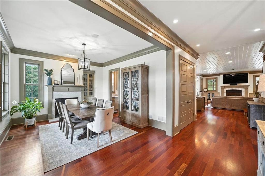 2229 Long Road Ball Ground, GA 30107 - Photo 13 of 88 a view of a dining room with furniture window and wooden floor