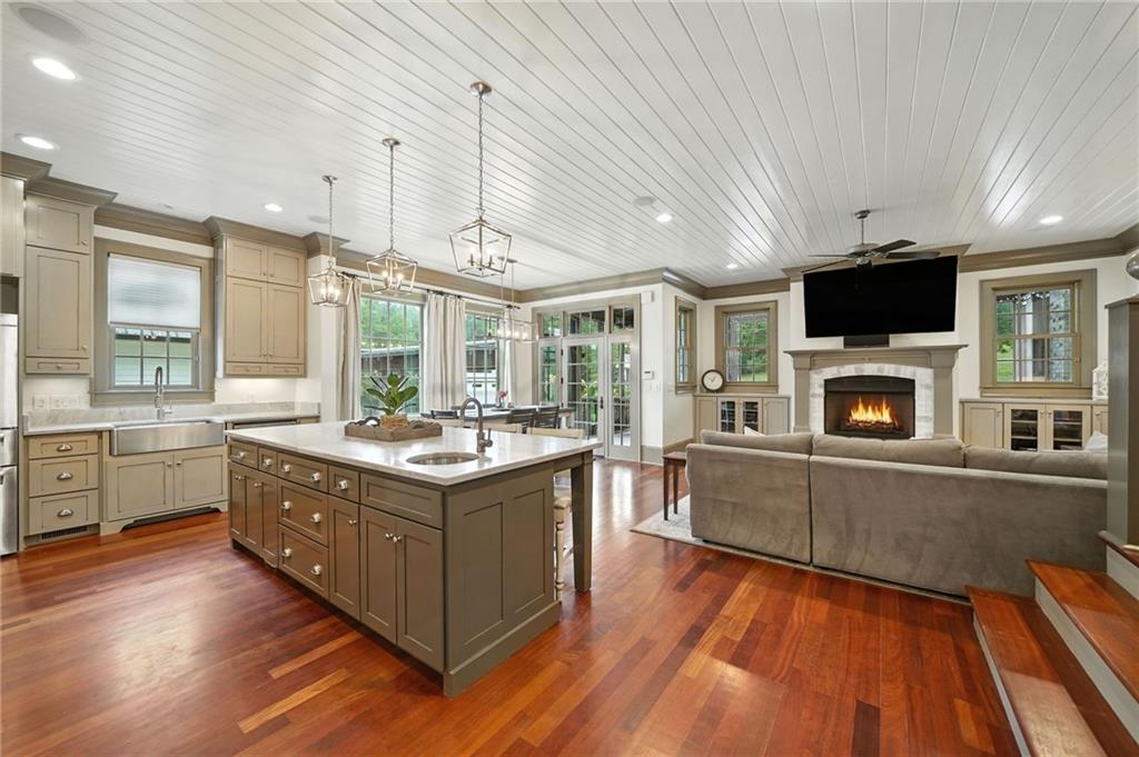 2229 Long Road Ball Ground, GA 30107 - Photo 16 of 88 a kitchen with stainless steel appliances granite countertop a stove and cabinets