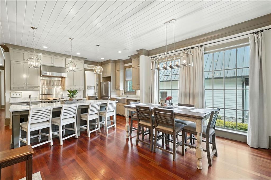 2229 Long Road Ball Ground, GA 30107 - Photo 25 of 88 a view of a dining room with furniture window and wooden floor