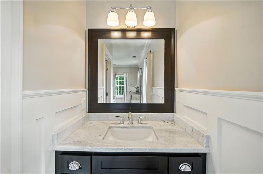 2229 Long Road Ball Ground, GA 30107 - Photo 46 of 88 a bathroom with a sink and a mirror