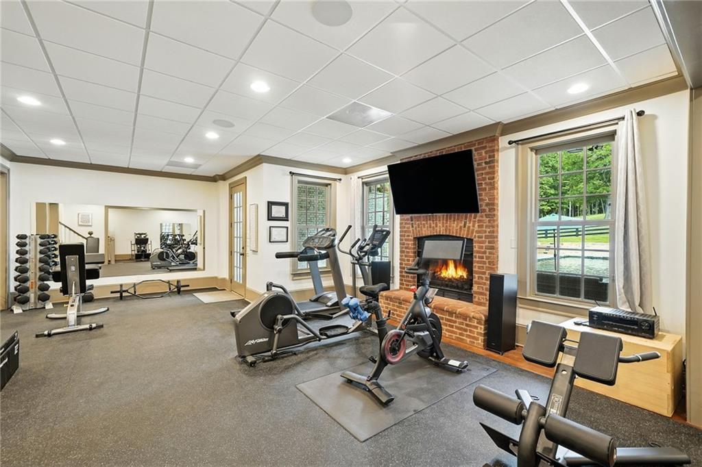 2229 Long Road Ball Ground, GA 30107 - Photo 54 of 88 a view of a livingroom with workspace and a window