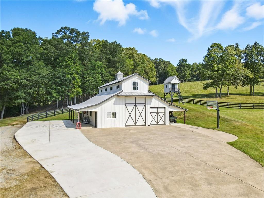 2229 Long Road Ball Ground, GA 30107 - Photo 69 of 88 a view of swimming pool with a yard