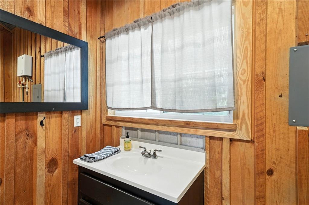 2229 Long Road Ball Ground, GA 30107 - Photo 75 of 88 a bathroom with a sink and a window