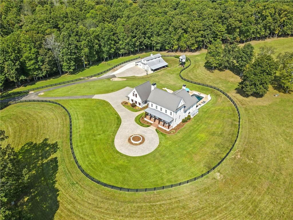 2229 Long Road Ball Ground, GA 30107 - Photo 83 of 88 an aerial view of a swimming pool