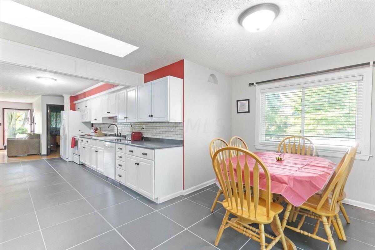 3880 Bunty Station Road Delaware, OH 43015 - Photo 15 of 34 08-Dining to Kitchen