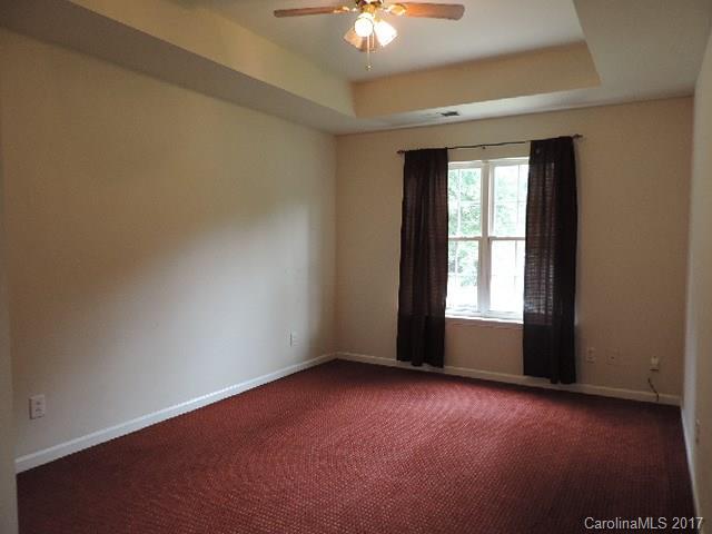 3726 Lake Road Charlotte, NC 28269 - Photo 12 of 18 an empty room with a window