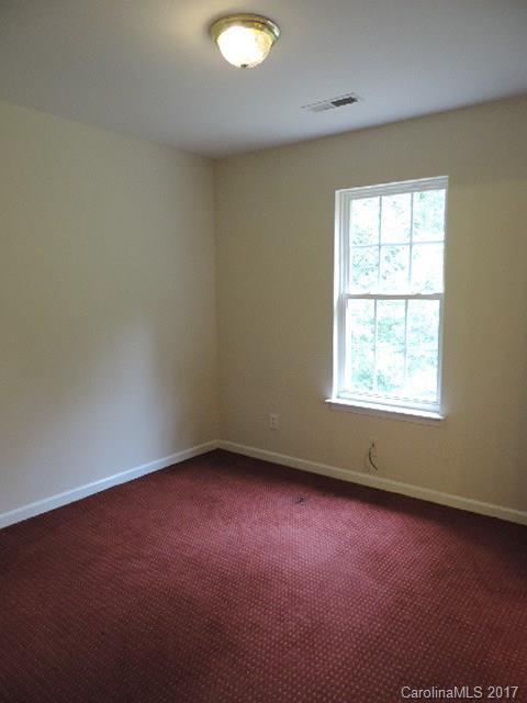 3726 Lake Road Charlotte, NC 28269 - Photo 15 of 18 an empty room with a window