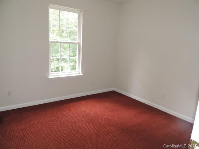 3726 Lake Road Charlotte, NC 28269 - Photo 18 of 18 an empty room with a window