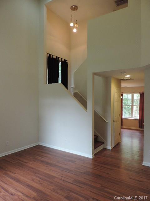 3726 Lake Road Charlotte, NC 28269 - Photo 9 of 18 a view of empty room with wooden floor