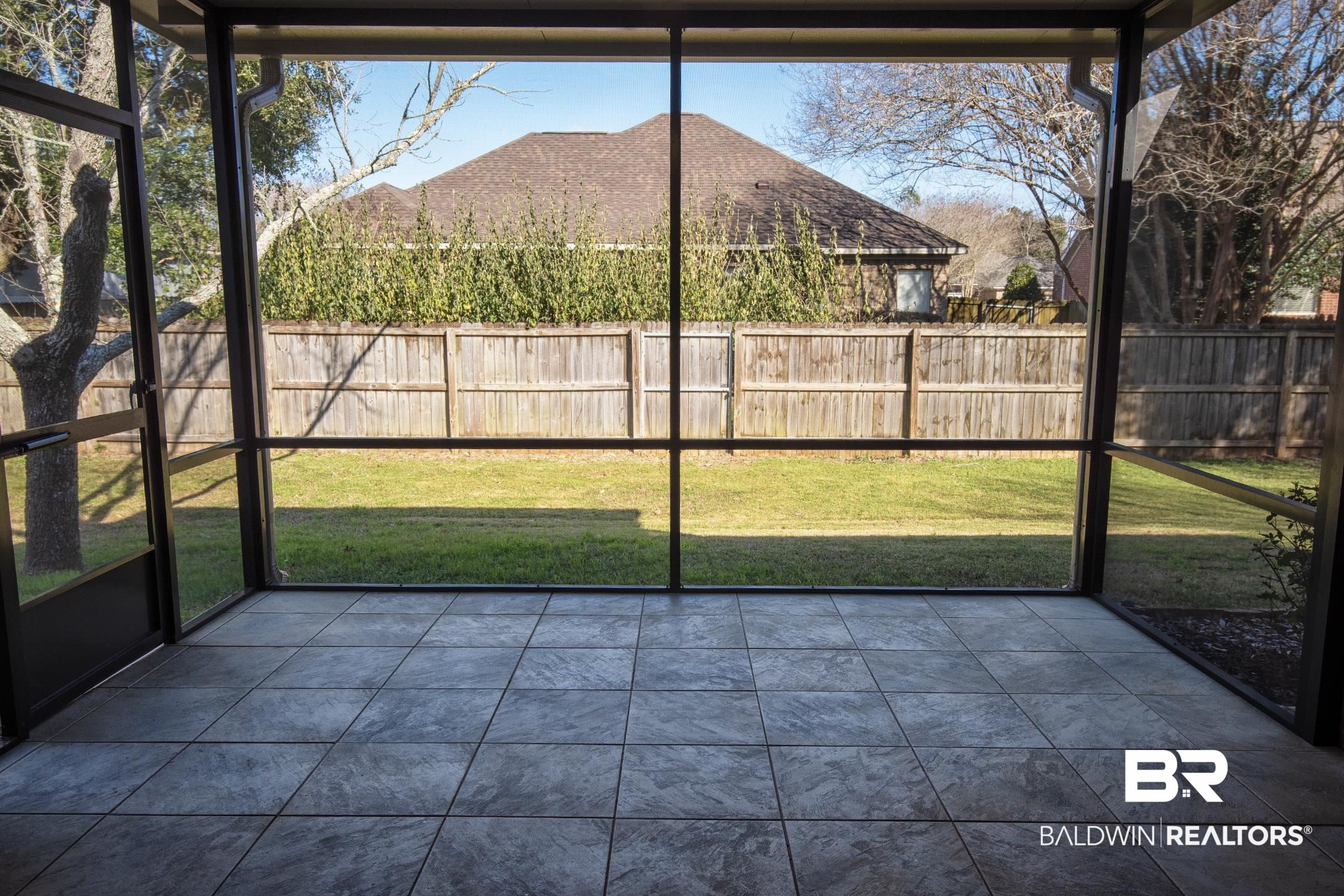 9421 Collier Loop Daphne, AL 36526 - Photo 11 of 31 View of unfurnished sunroom