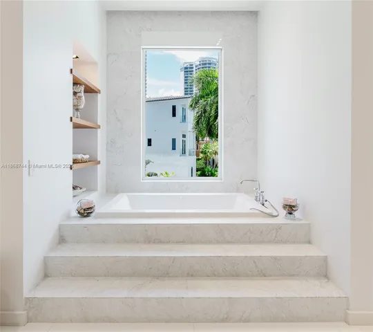 a view of a swimming pool with a garden