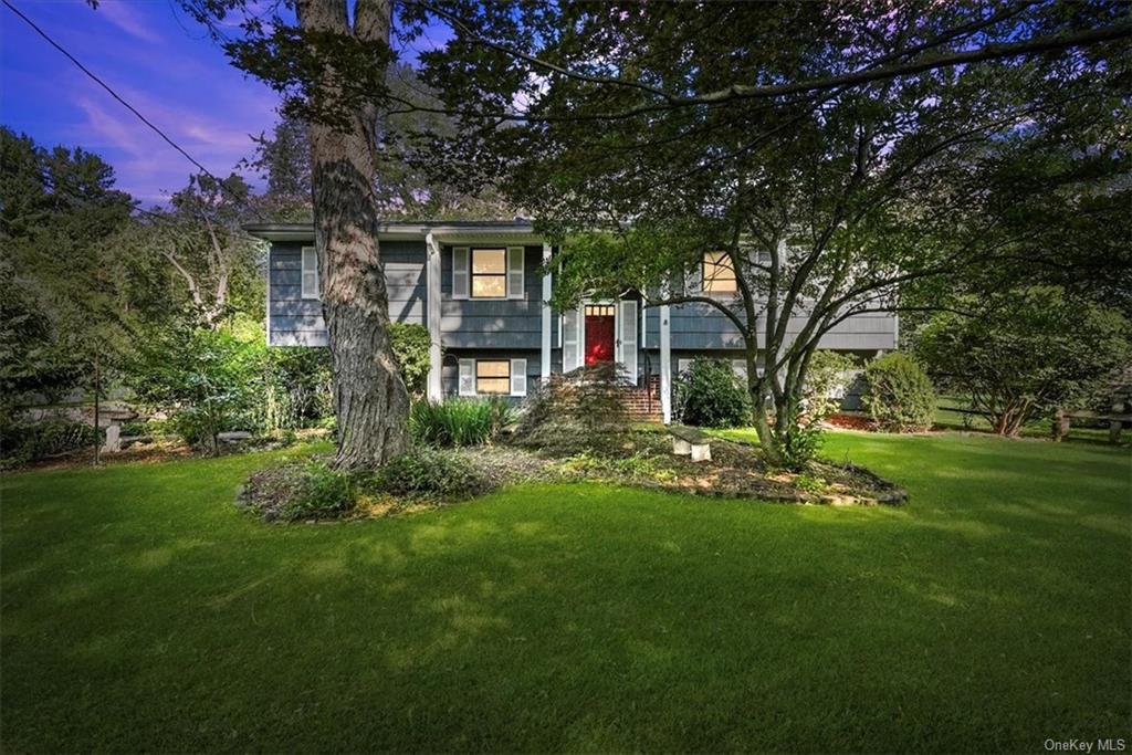 2738 Moreland Street Yorktown Heights, NY 10598 - Photo 1 of 25 a front view of a house with garden