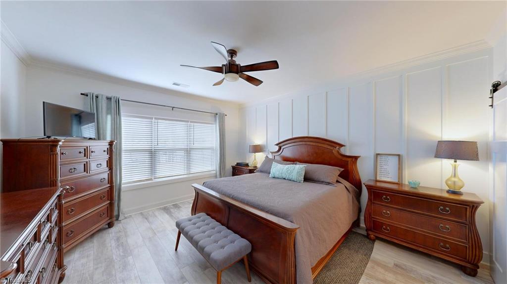 245 Rolling Road Lexington, NC 27292 - Photo 26 of 48 Primary Bedroom with view of the lake