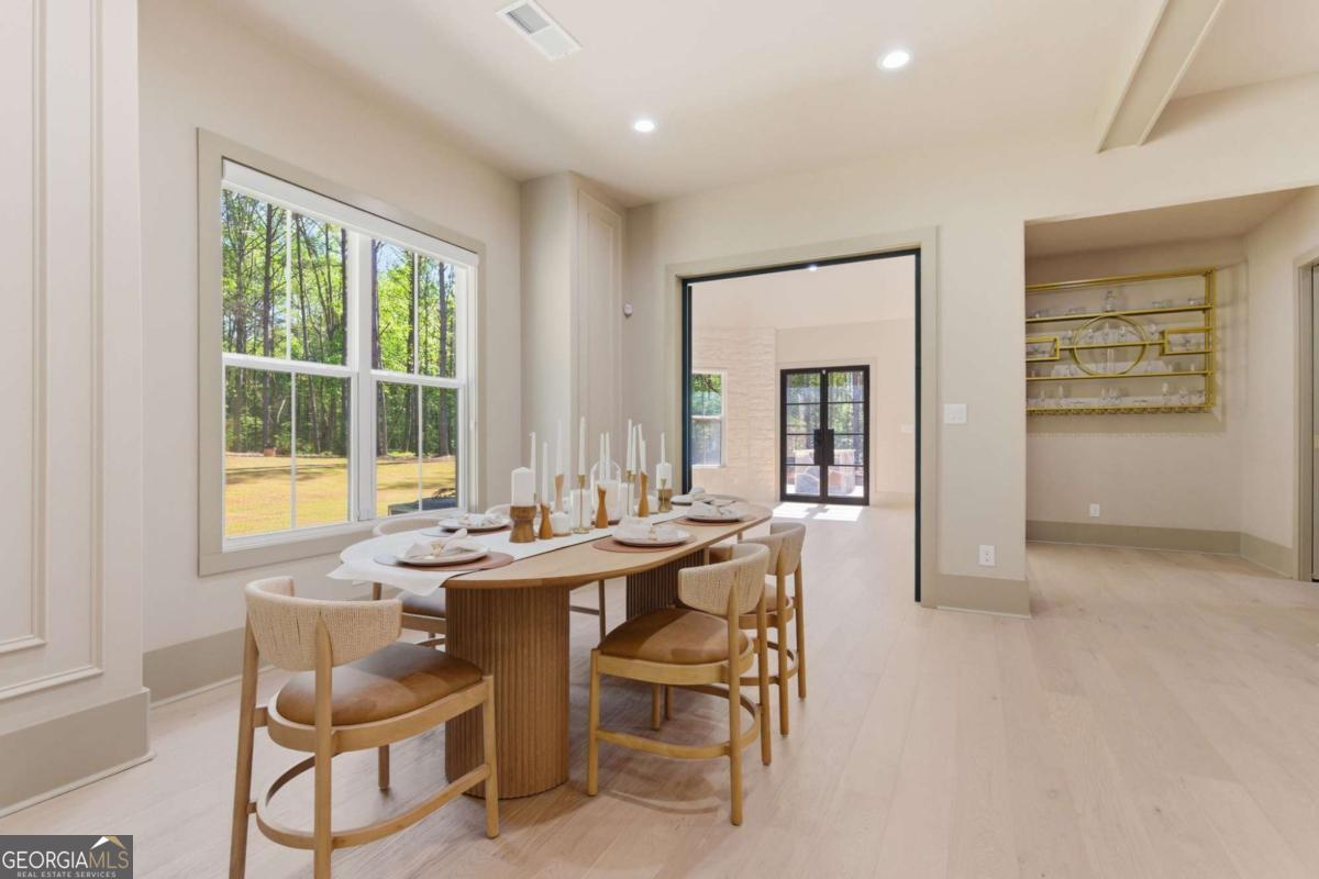 1315 Sandy Creek Road Tyrone, GA 30290 - Photo 47 of 100 a dining room with furniture and window