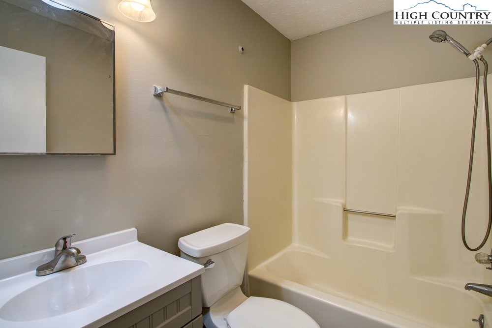 591-573 Margot Road Boone, NC 28607 - Photo 8 of 15 a bathroom with a sink a toilet and shower