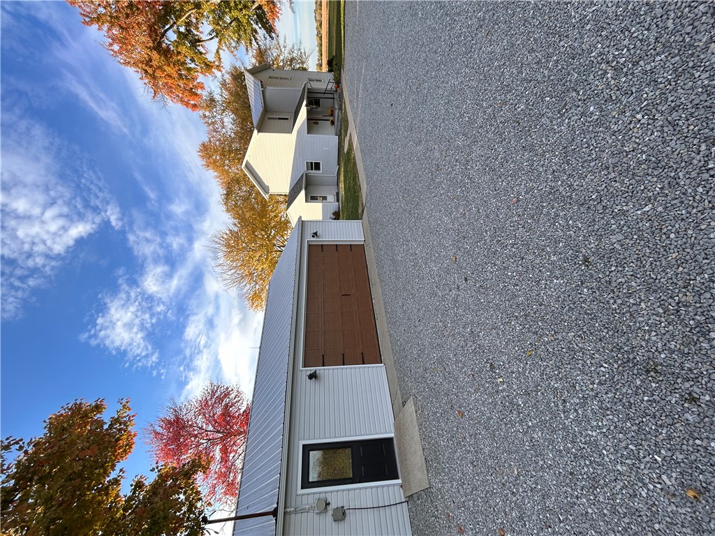 2086 Scheyhing Road Lewisburg, OH 45338 - Photo 7 of 29 This charming property features a detached garage and a well-maintained gravel driveway.
