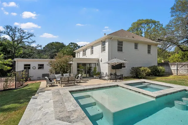 a view of a house with sitting area and furniture