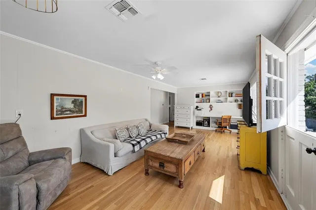 a living room with furniture and a couch