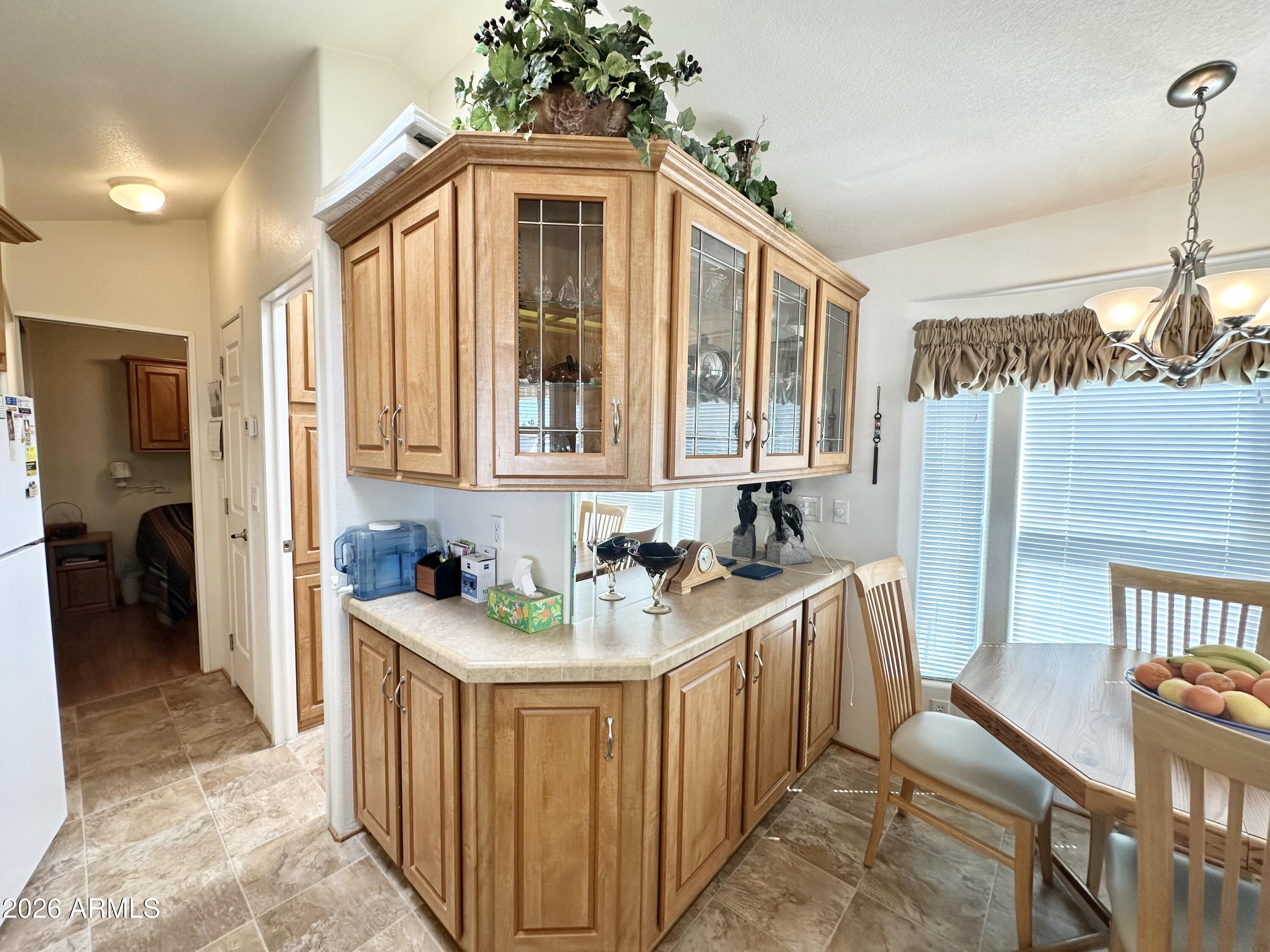 111 South Greenfield Road, Unit 790 Mesa, AZ 85206 - Photo 24 of 71 WRAP AROUND CABINETS/BUFFET AREA