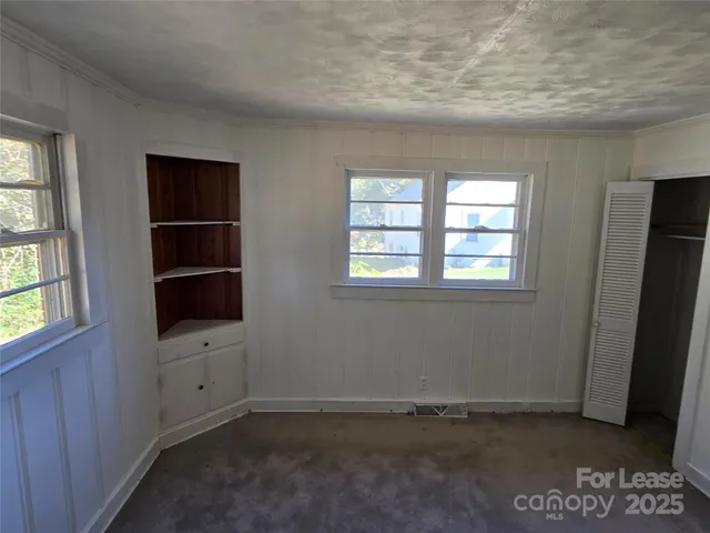 an empty room with windows