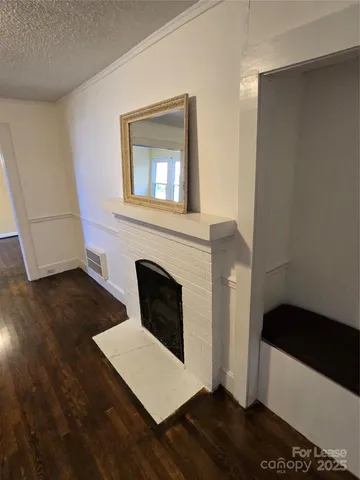 a living room with a fireplace