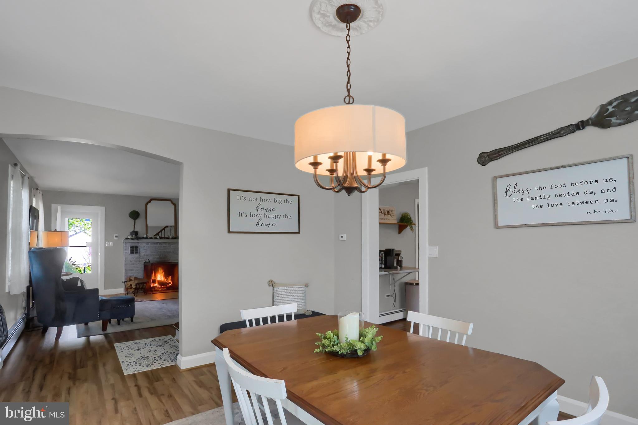 3209 Peters Mountain Road Halifax, PA 17032 - Photo 11 of 56 a view of a dining room with furniture wooden floor and chandelier