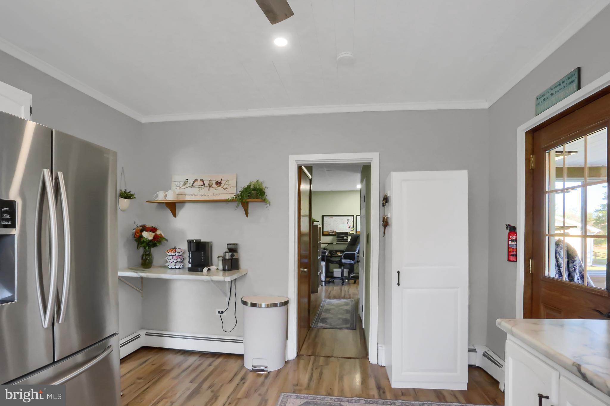 3209 Peters Mountain Road Halifax, PA 17032 - Photo 15 of 56 a kitchen with stainless steel appliances a refrigerator and sink