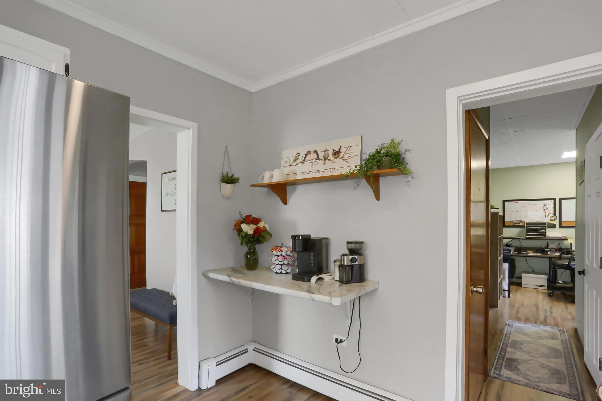 3209 Peters Mountain Road Halifax, PA 17032 - Photo 16 of 56 a kitchen with a refrigerator and a sink