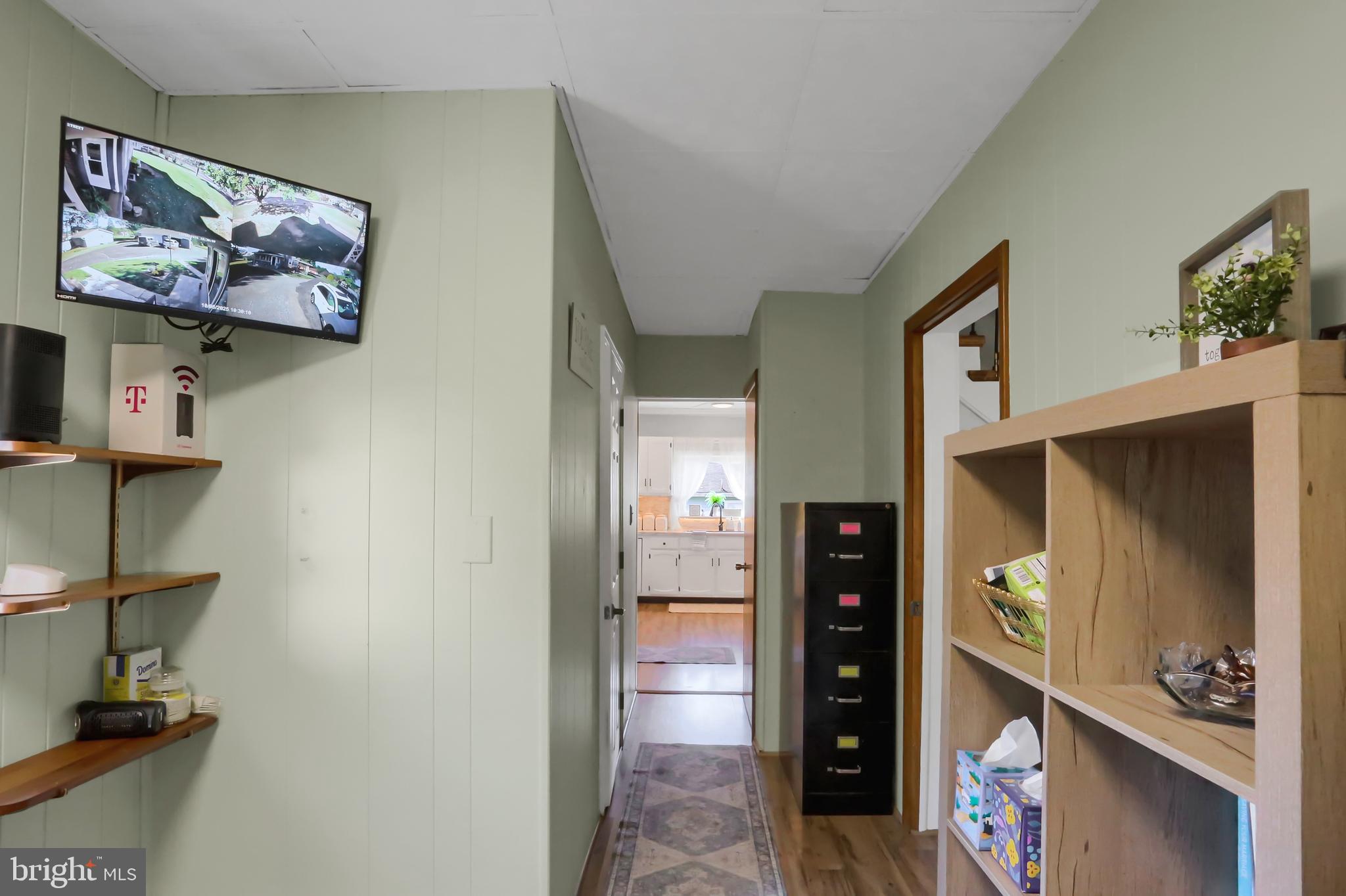 3209 Peters Mountain Road Halifax, PA 17032 - Photo 18 of 56 a view of a hallway with wooden floor and furniture