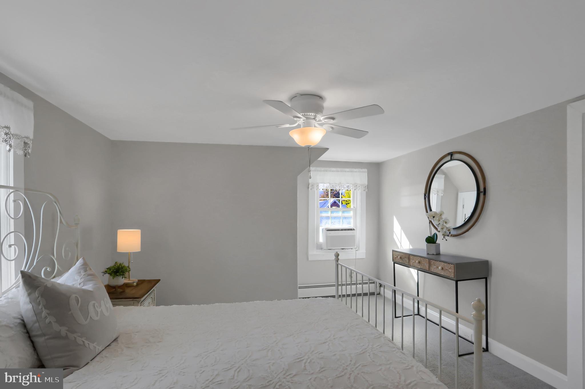 3209 Peters Mountain Road Halifax, PA 17032 - Photo 22 of 56 a lamp on a table in a room