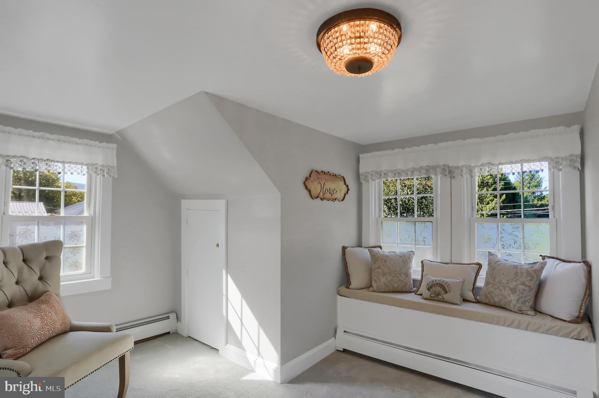 3209 Peters Mountain Road Halifax, PA 17032 - Photo 24 of 56 a living room with furniture and a window