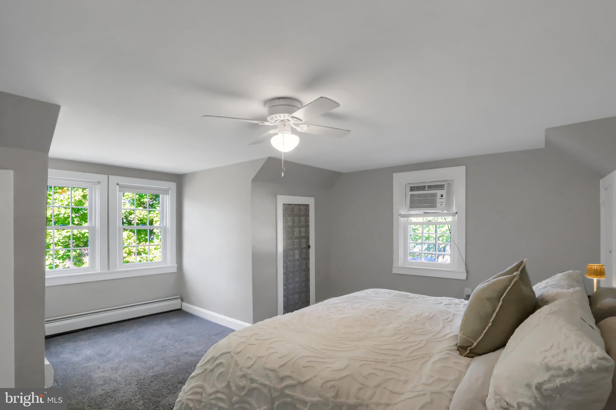 3209 Peters Mountain Road Halifax, PA 17032 - Photo 26 of 56 a bedroom with a bed and a window