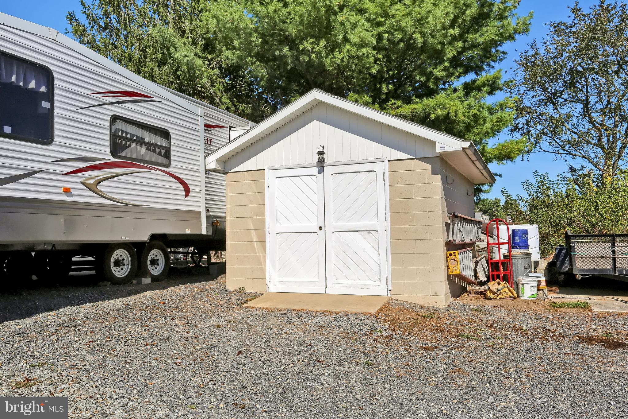 3209 Peters Mountain Road Halifax, PA 17032 - Photo 56 of 56 a view of a house with a garage