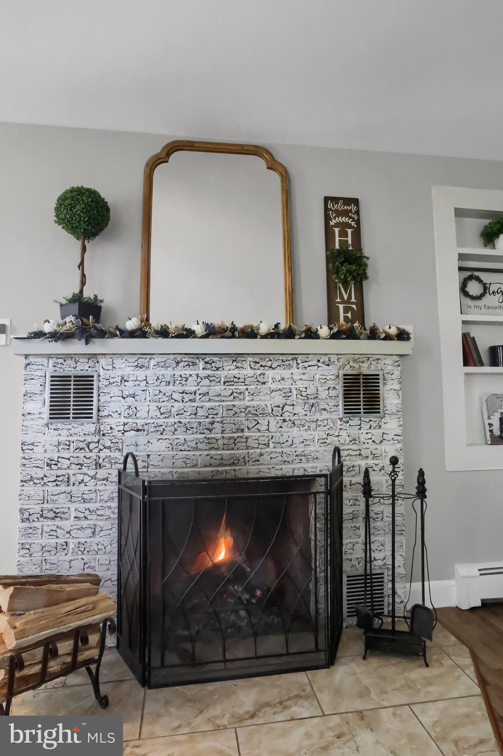 3209 Peters Mountain Road Halifax, PA 17032 - Photo 6 of 56 a living room with furniture and a fireplace