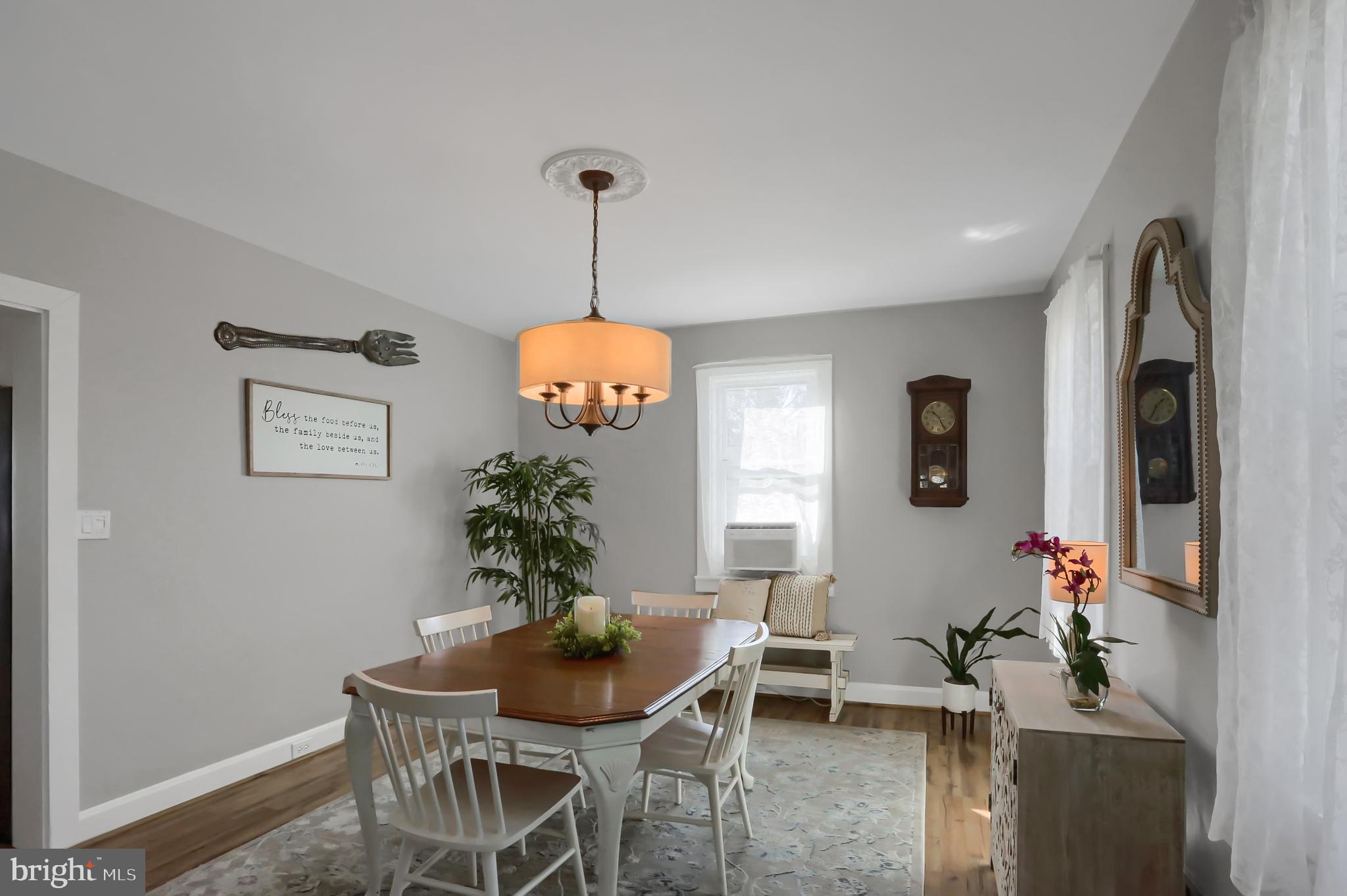 3209 Peters Mountain Road Halifax, PA 17032 - Photo 10 of 56 a view of a dining room with furniture window and wooden floor