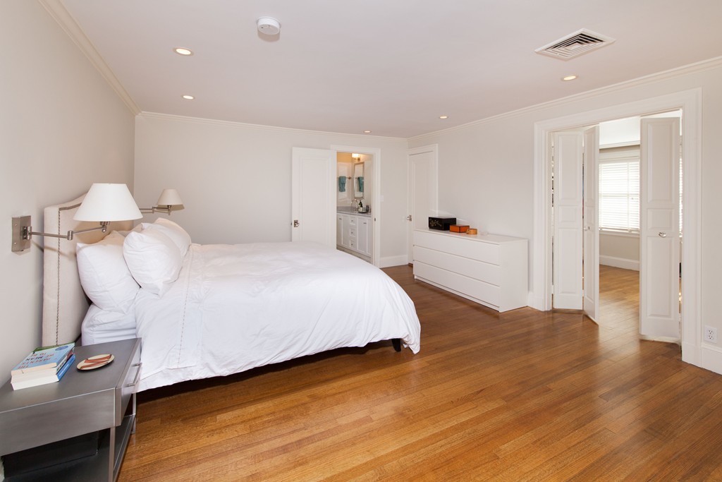 21 Gralynn Road Newton, MA 02459 - Photo 5 of 9 a bedroom with a bed and wooden floor