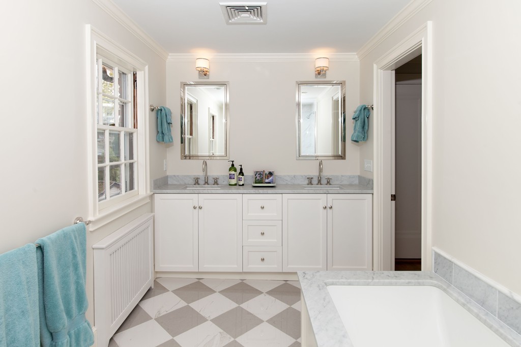 21 Gralynn Road Newton, MA 02459 - Photo 6 of 9 a bathroom with a sink and a mirror