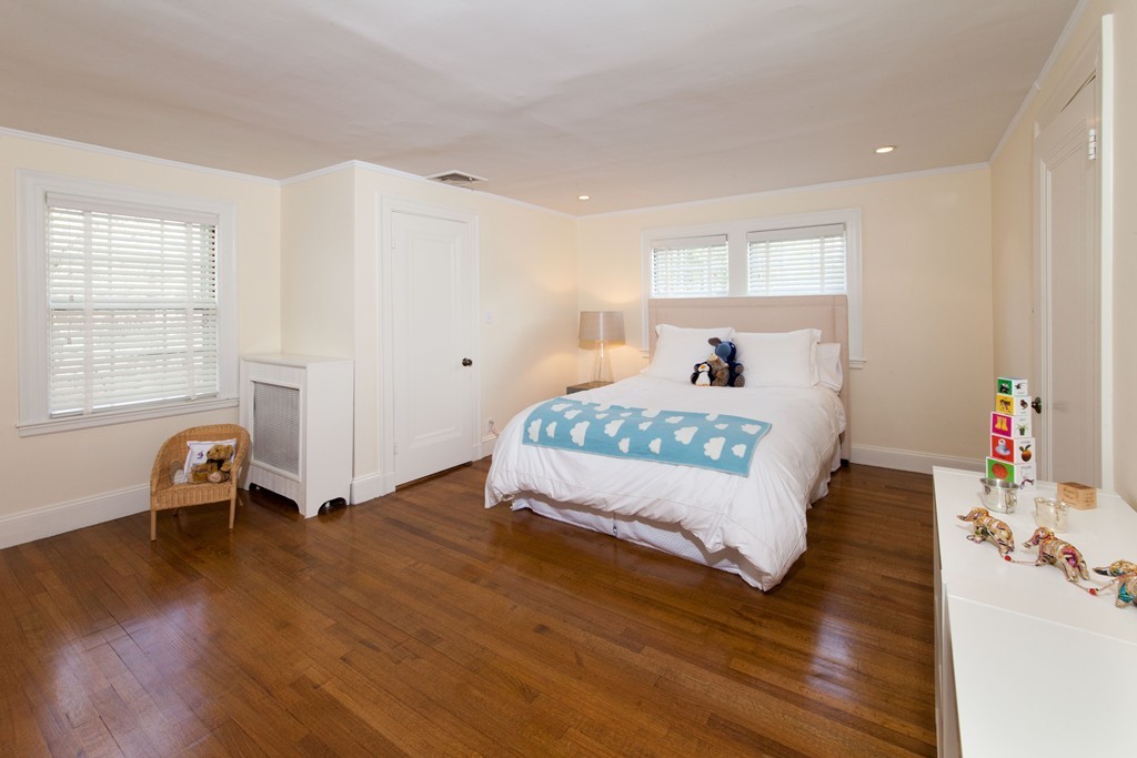 21 Gralynn Road Newton, MA 02459 - Photo 7 of 9 a living room with furniture and a wooden floor