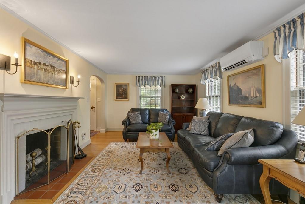 7 Mohawk Road Marblehead, MA 01945 - Photo 5 of 32 a living room with furniture and a fireplace