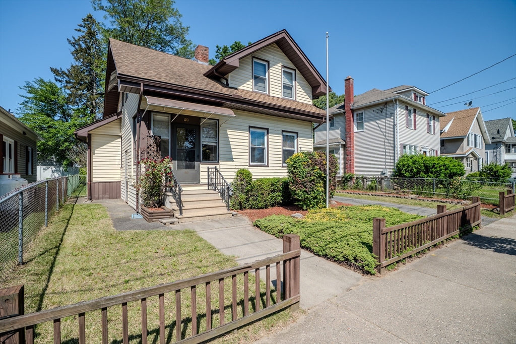 50 Duryea Street Springfield, MA 01104 - Photo 2 of 29 a front view of a house with garden