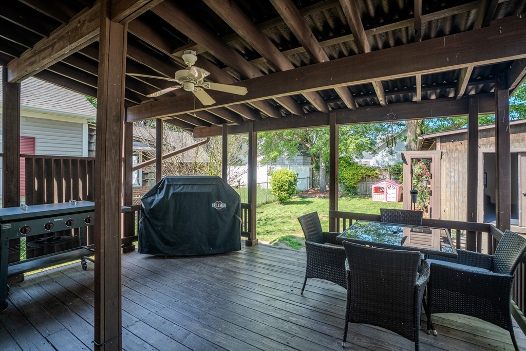 50 Duryea Street Springfield, MA 01104 - Photo 24 of 29 a view of a porch with furniture and a yard