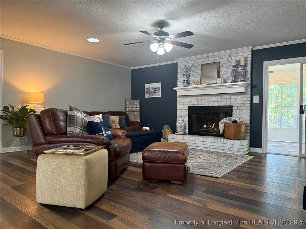 3057 Westminster Road Lumberton, NC 28360 - Photo 16 of 35 a living room with furniture and a fireplace