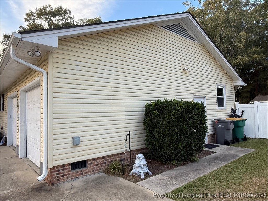 3057 Westminster Road Lumberton, NC 28360 - Photo 5 of 35 a view of a house with a backyard