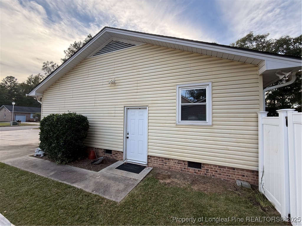 3057 Westminster Road Lumberton, NC 28360 - Photo 6 of 35 a view of a house with a yard
