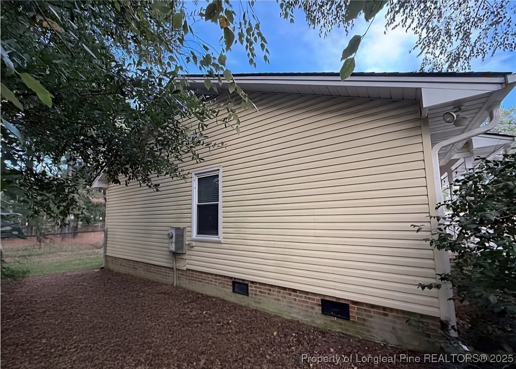 3057 Westminster Road Lumberton, NC 28360 - Photo 8 of 35 a view of a house with a yard and garage