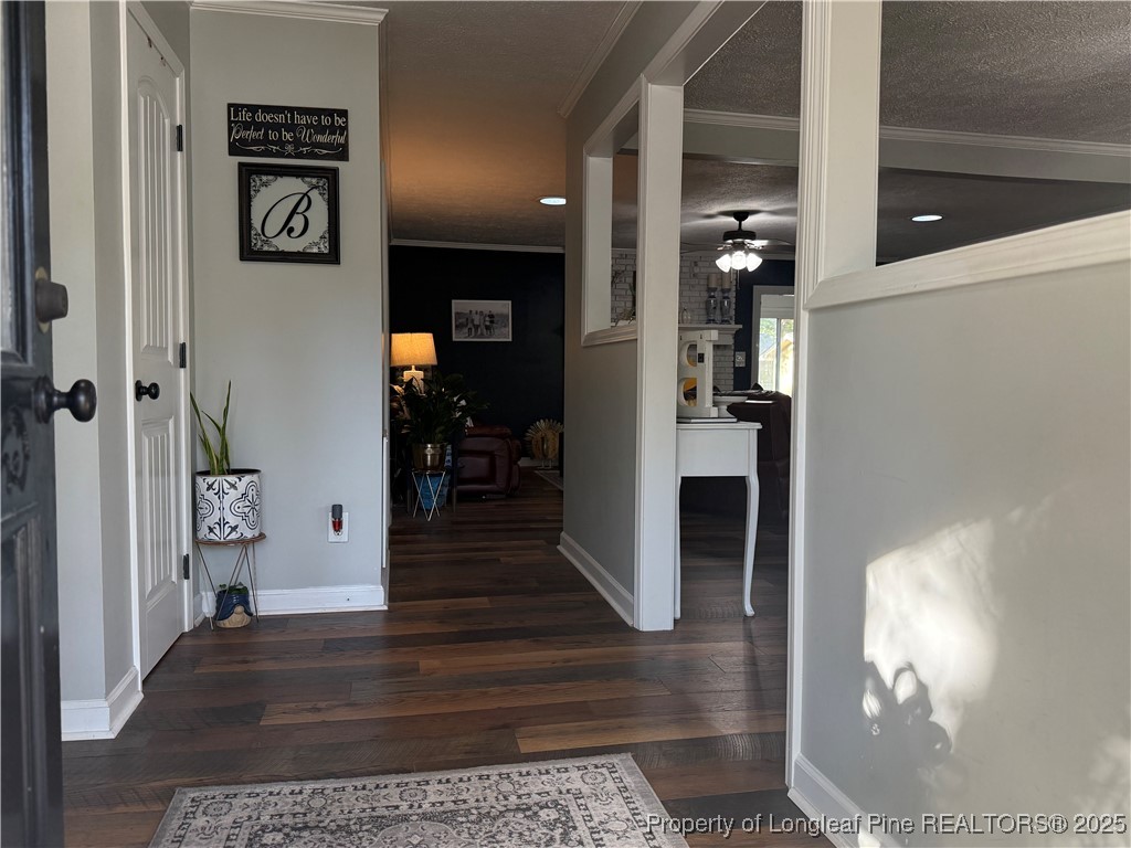 3057 Westminster Road Lumberton, NC 28360 - Photo 10 of 35 a view of a hallway with wooden floor and stairs