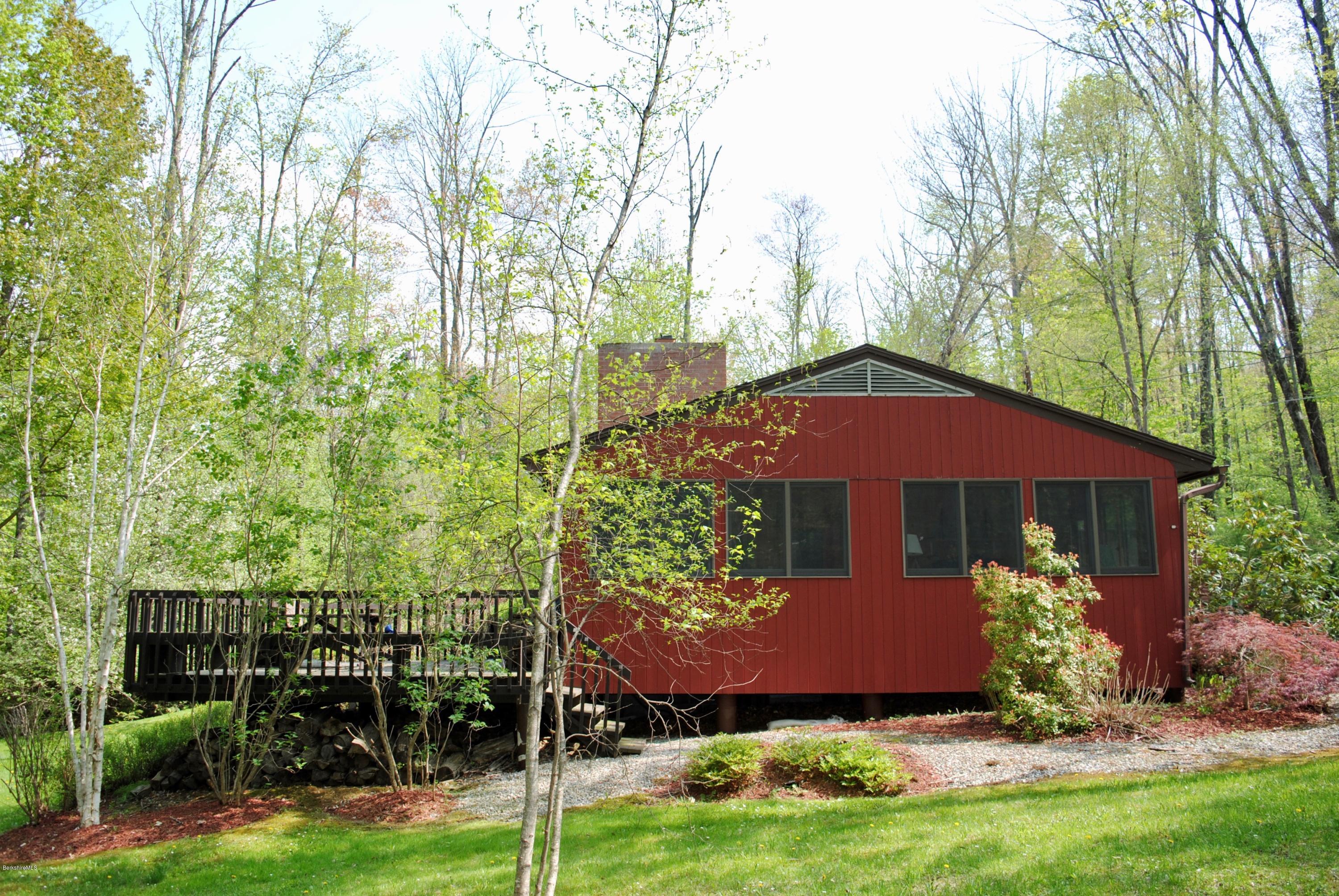1 Mohigan Road Stockbridge, MA 01262 - Photo 4 of 15 a front view of a house with garden