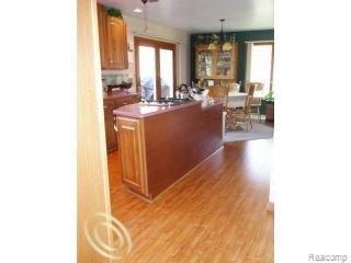 7860 Thomas Road Unionville, MI 48767 - Photo 10 of 18 7860 KITCHEN AND CENTER ISLAND.j